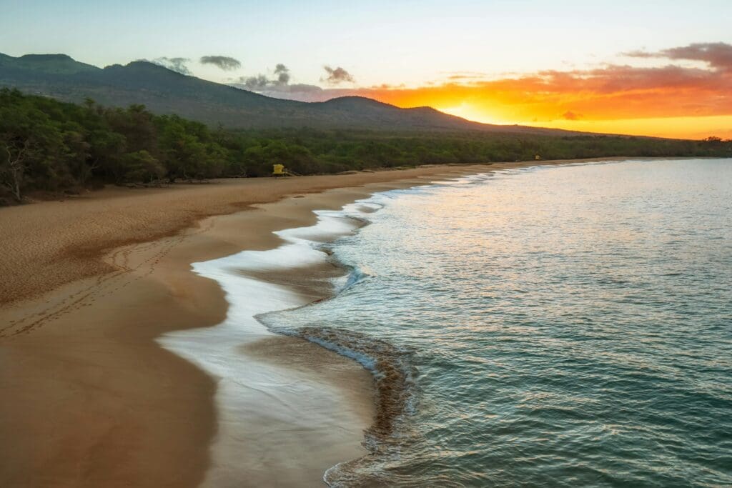 Maui beach and mountains at sunset